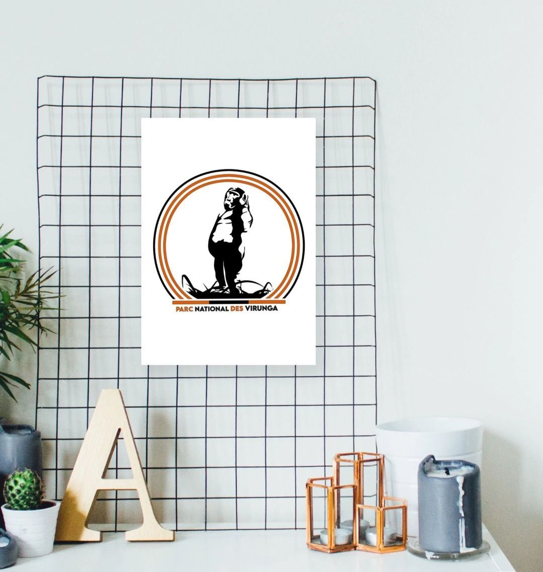 A Take A Stand Poster, placed on a wall above a small wooden table and various decor items.