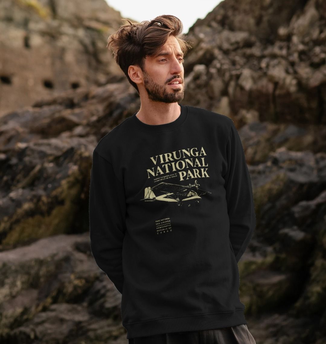 A man wearing a black Virunga Pilot Men's Sweater