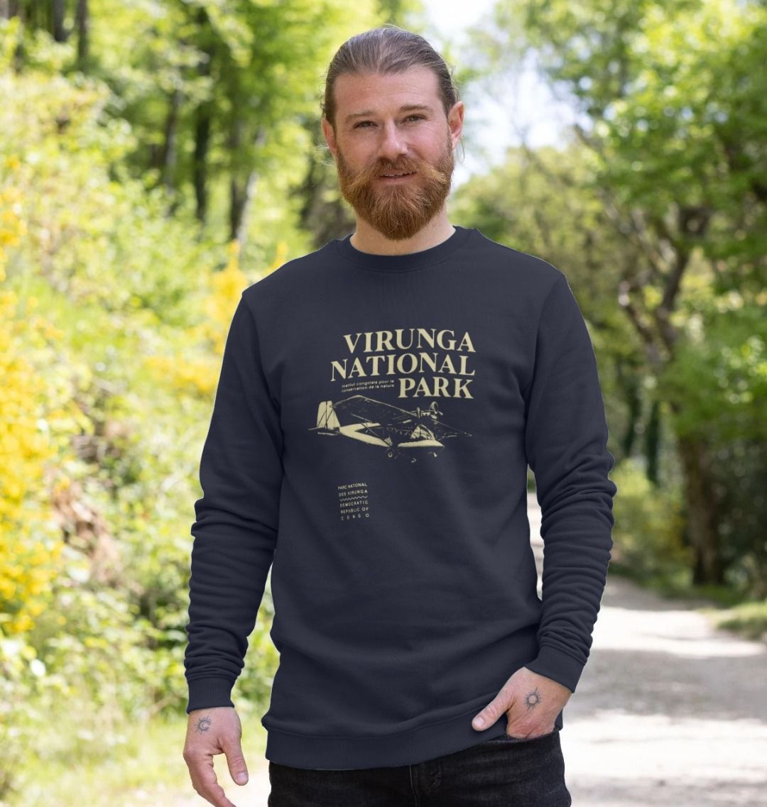 A man wearing a navy blue Virunga Pilot Men's Sweater