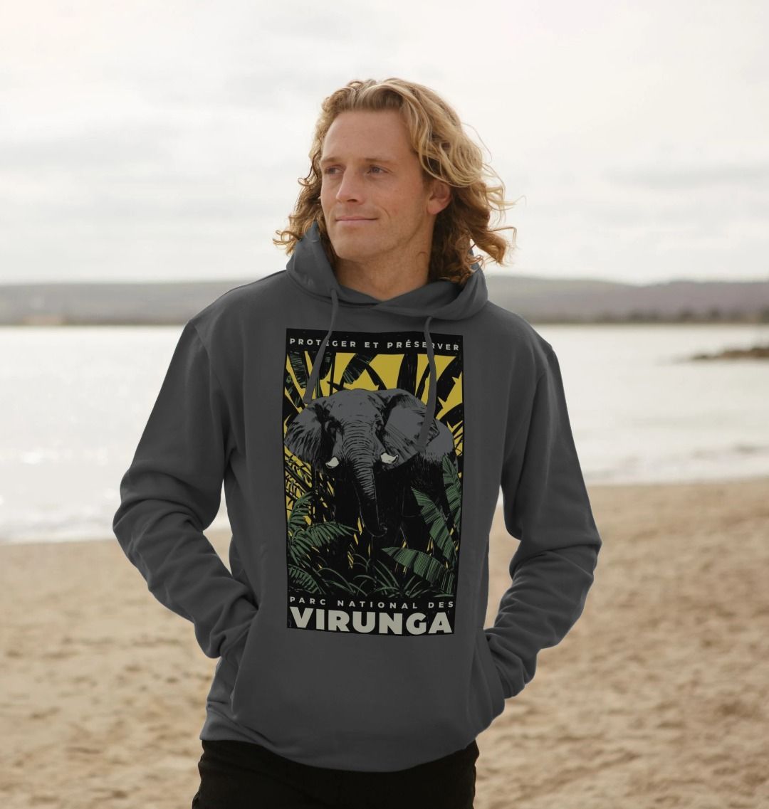 A man standing on a beach wearing a gray African Elephant Yellow Print Men's Hoodie