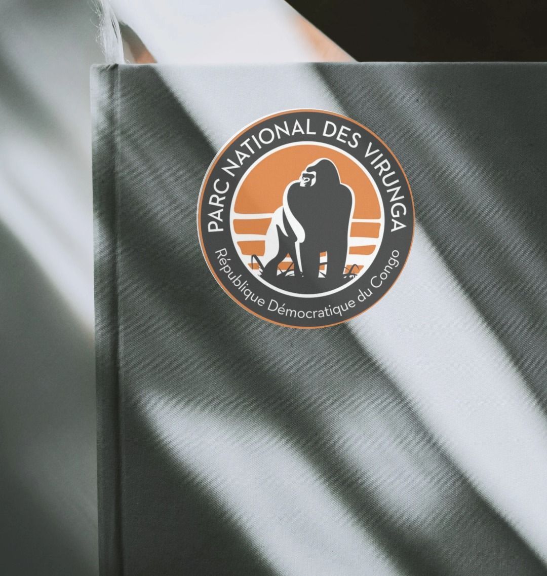 Virunga Logo Sticker on a Notebook