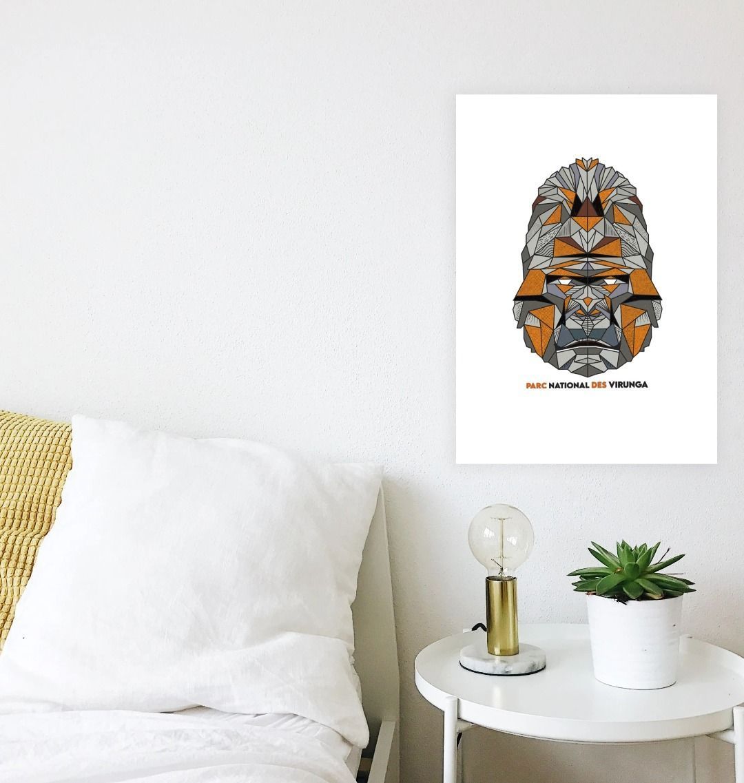 A Gorilla Face Poster on the hall in the bedroom 