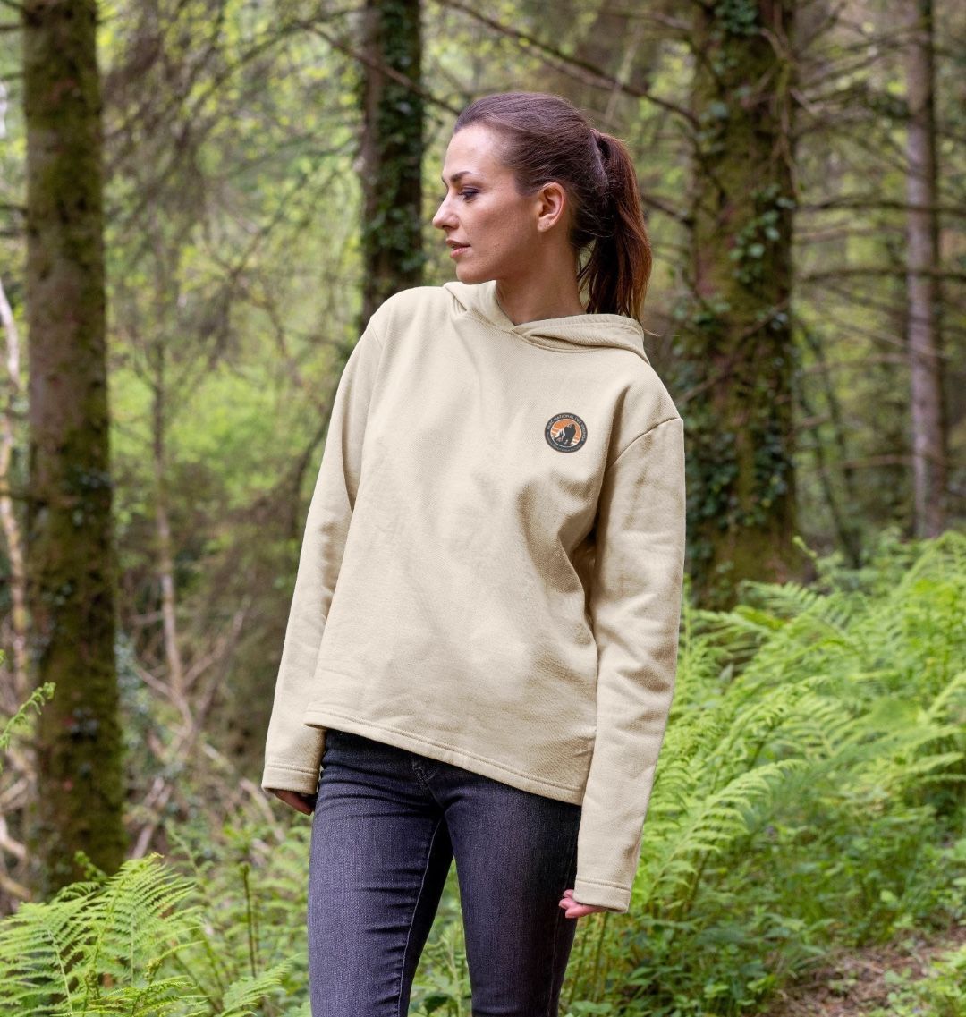 A Woman Wearing an Oat Lion Women's Hoodie
