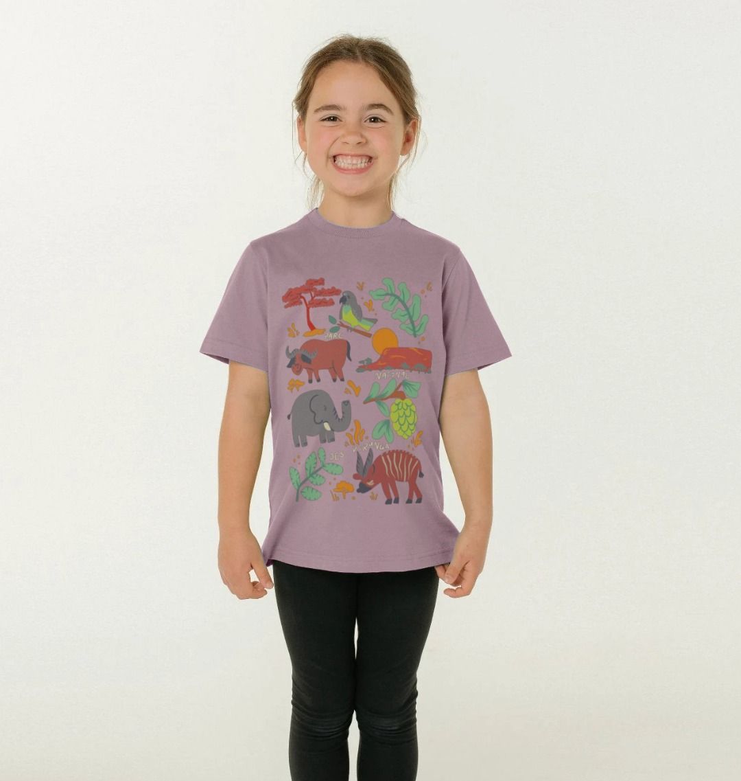 A kid wearing a mauve savanna wildlife kids t-shirt