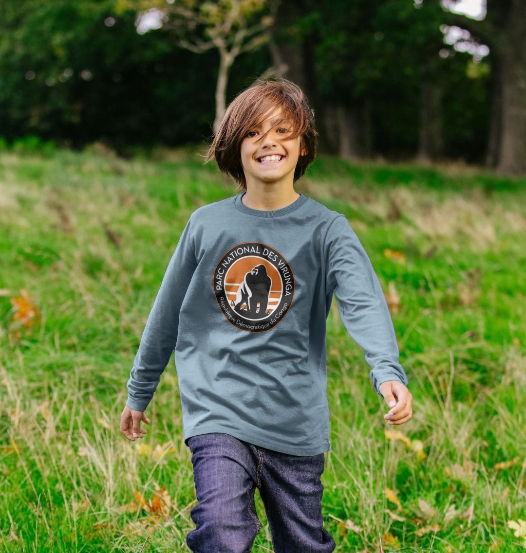 A kid wearing a stone blue Virunga Logo Kids Long Sleeve