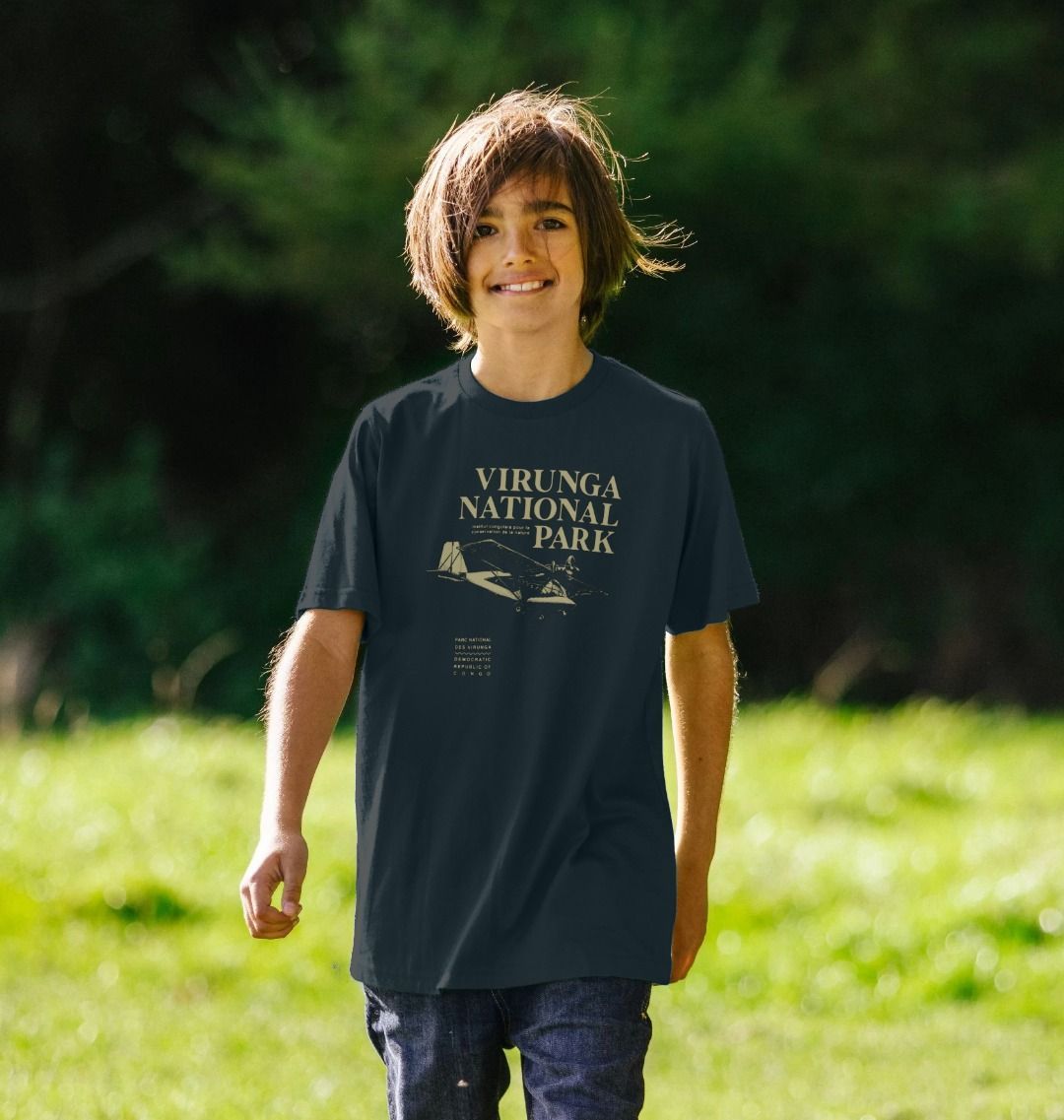 A kid wearing denim blue Virunga Pilot Kids T-shirt