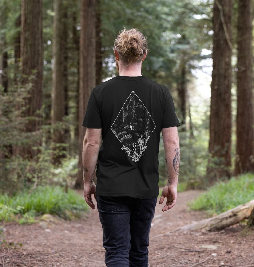 A man wearing a Black Men's Okapi T-shirt