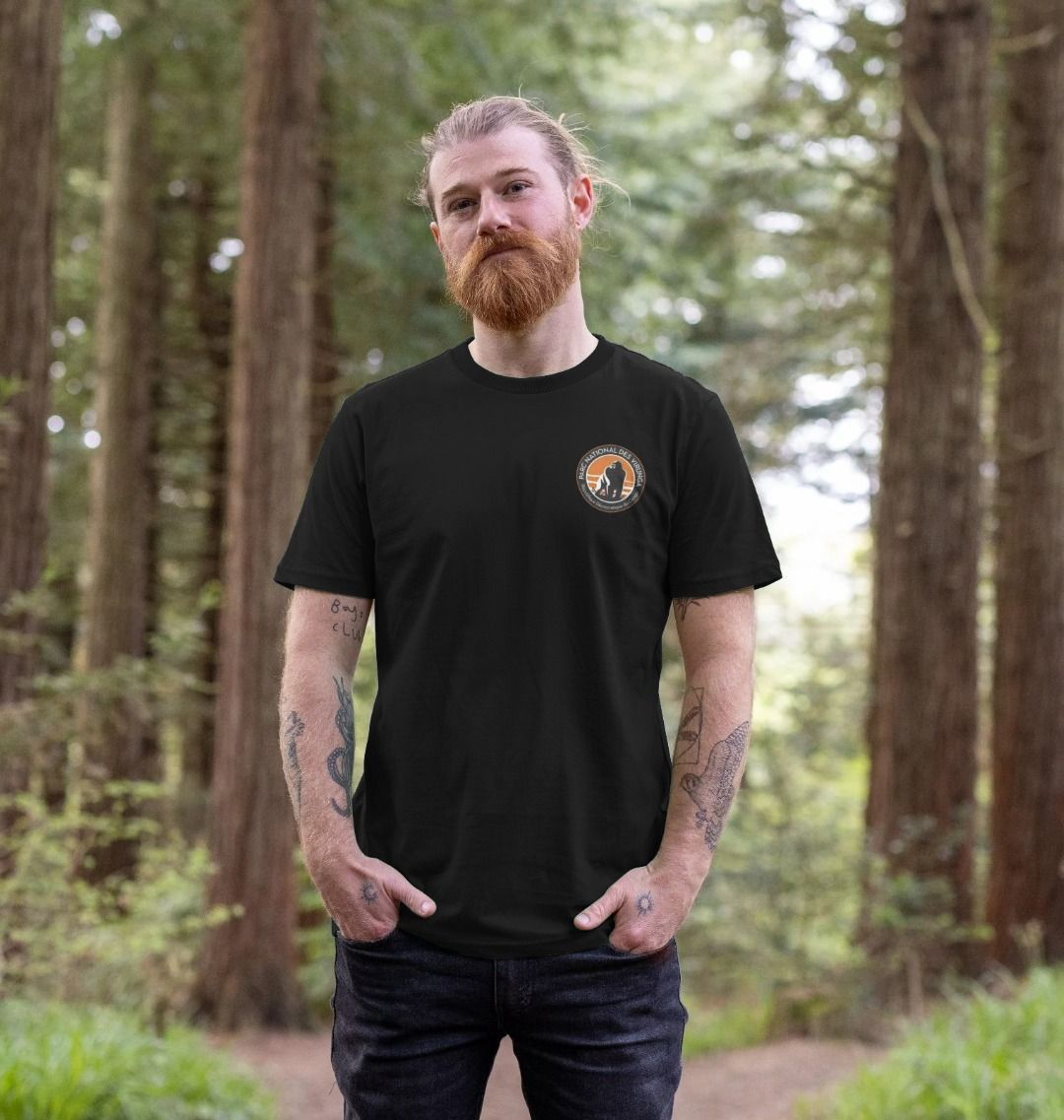 A man wearing a Black Men's Okapi T-shirt