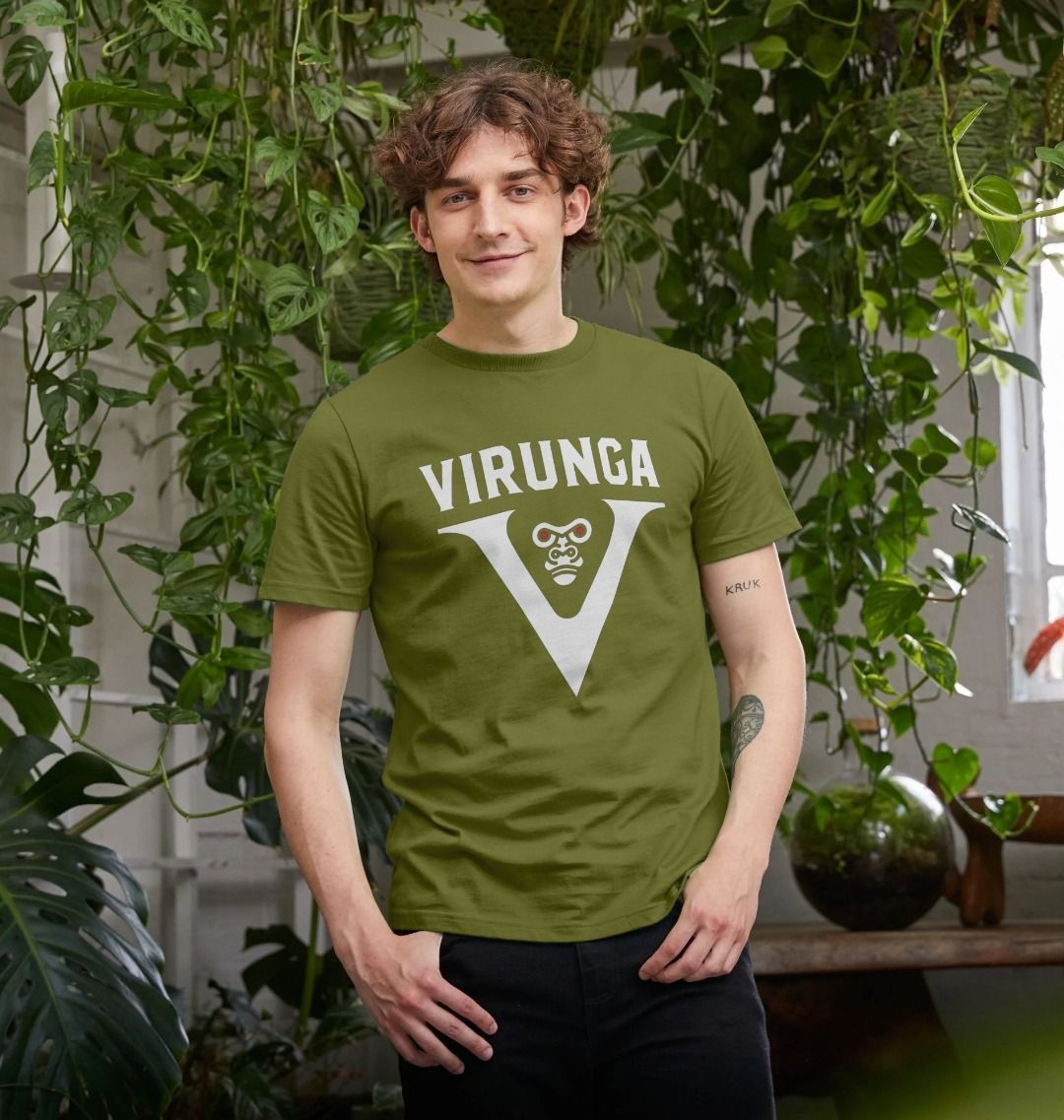 A man wearing a moss green V for Virunga Men's T-shirt 