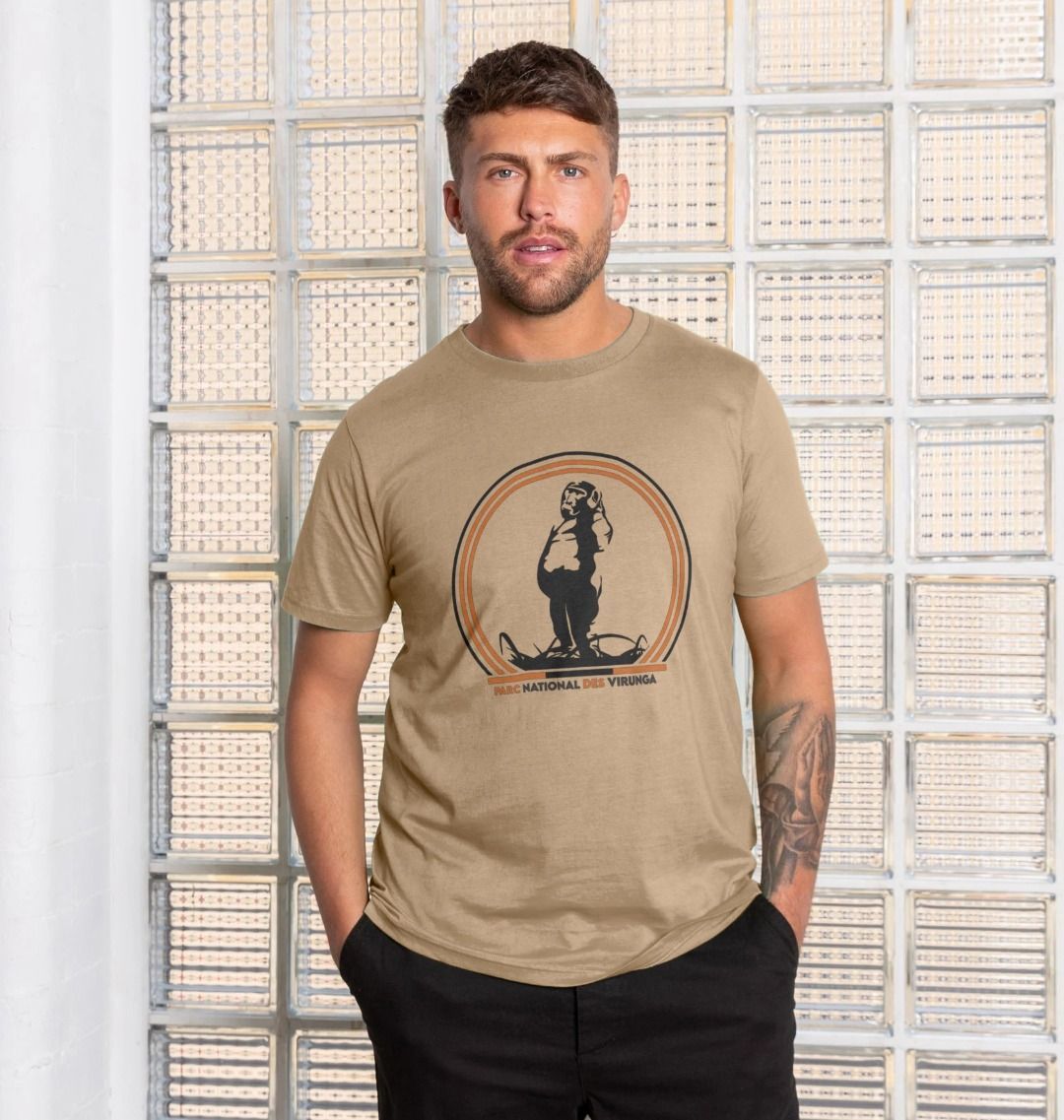 A man wearing a sand Take A Stand Men's T-shirt