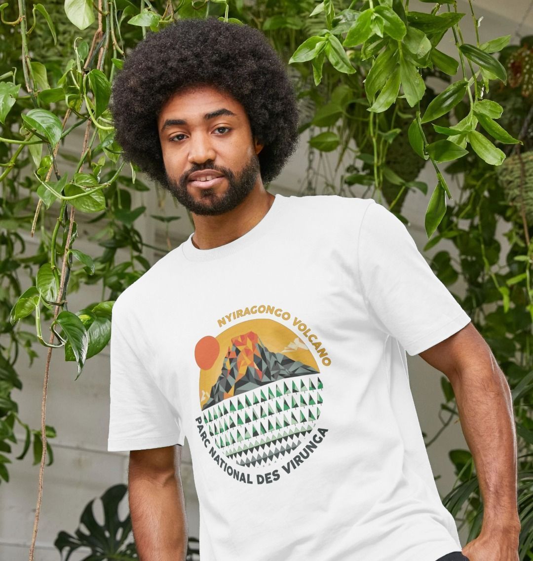 A man wearing a white Nyiragongo Volcano Men's T-shirt