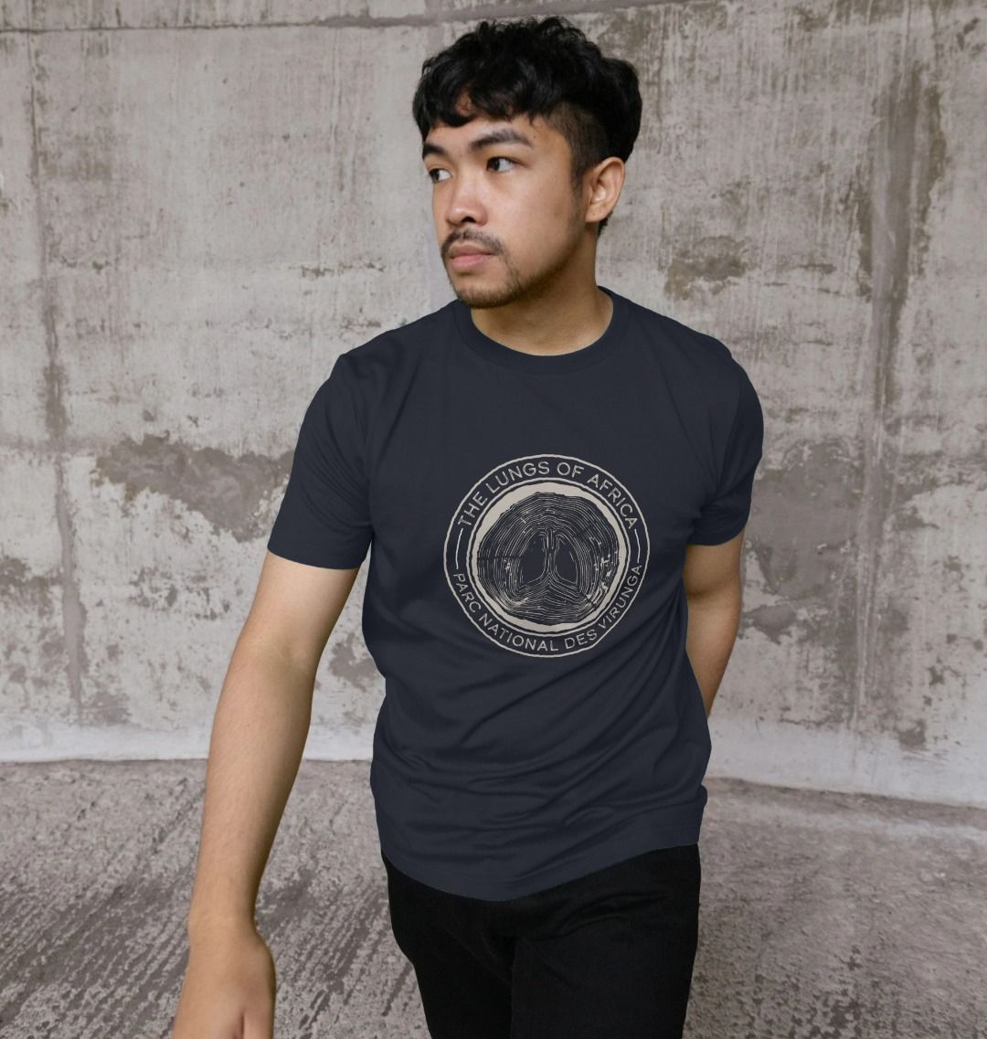 A white man wearing a navy blue Lungs of Africa Men's T-shirt