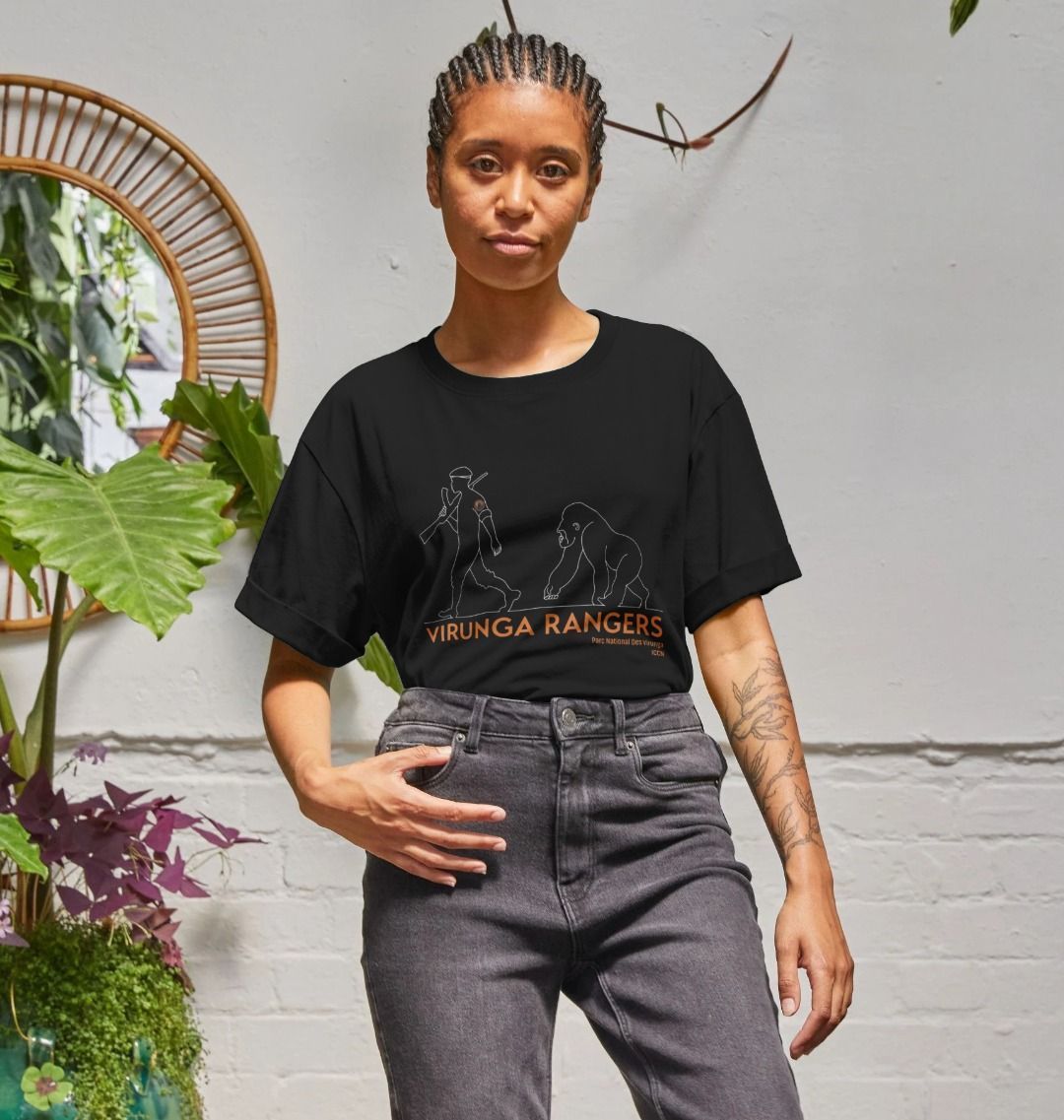 A woman wearing a black mountain gorilla ranger women's relaxed tee