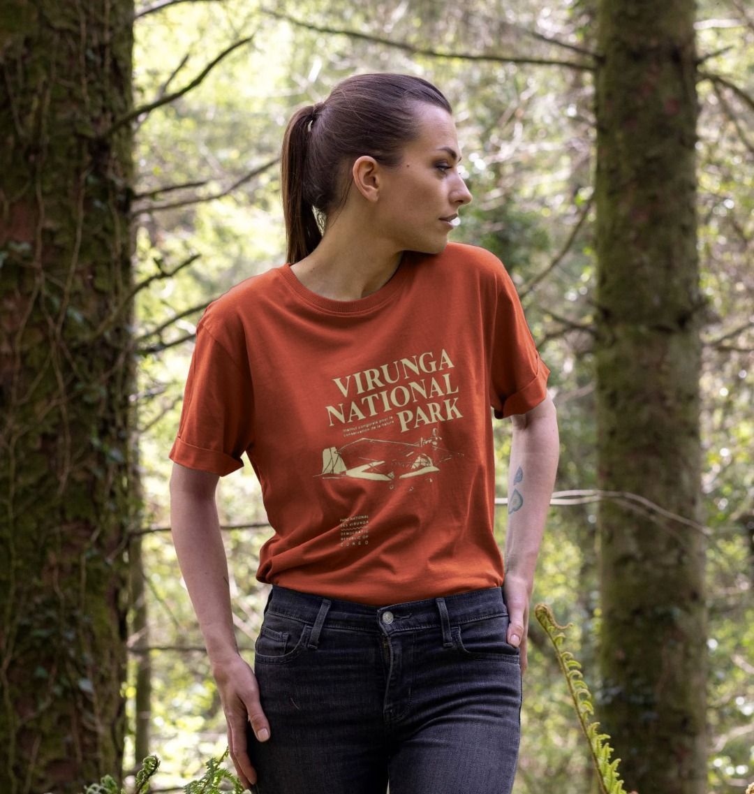 A woman wearing a dust Virunga Pilot Women's Relaxed Tee 