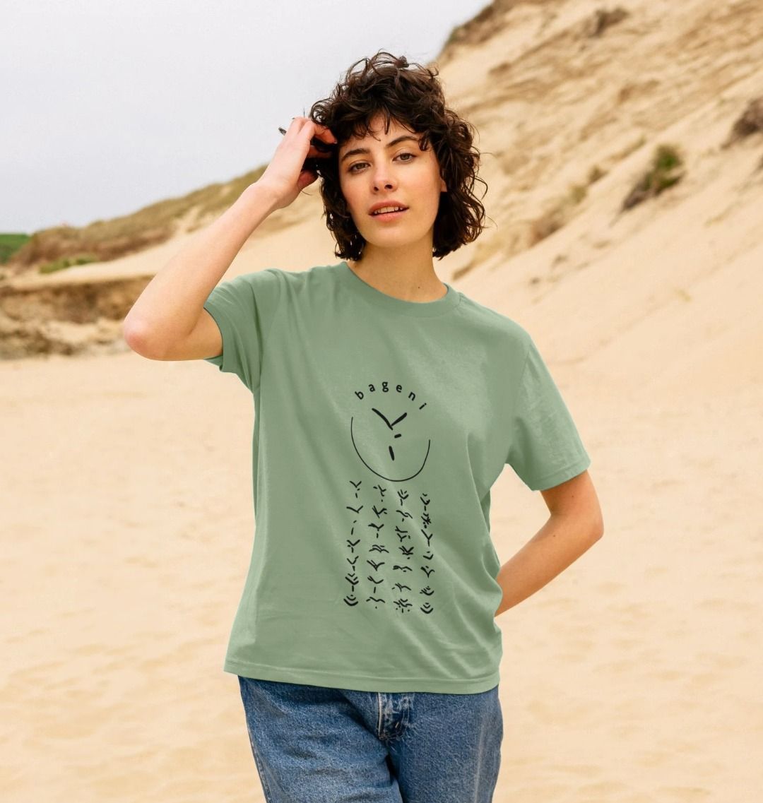 A woman wearing a sage bageni family women's T-shirt