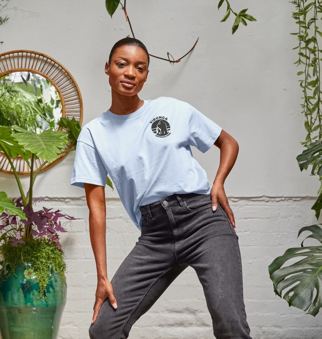 A woman wearing a sky blue gorilla women's boxy tee