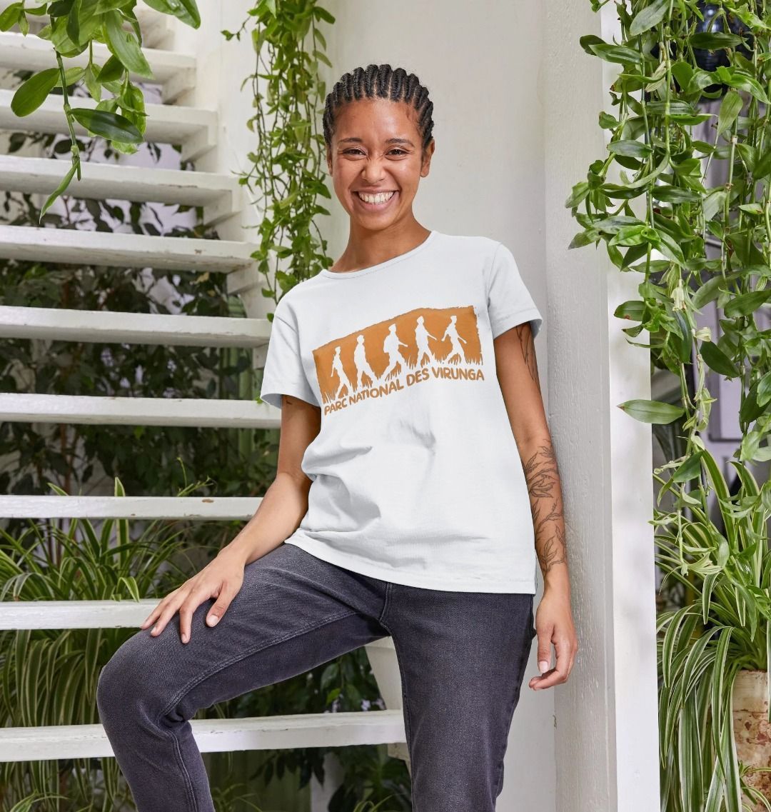 A woman wearing a white Virunga Rangers Women's Top