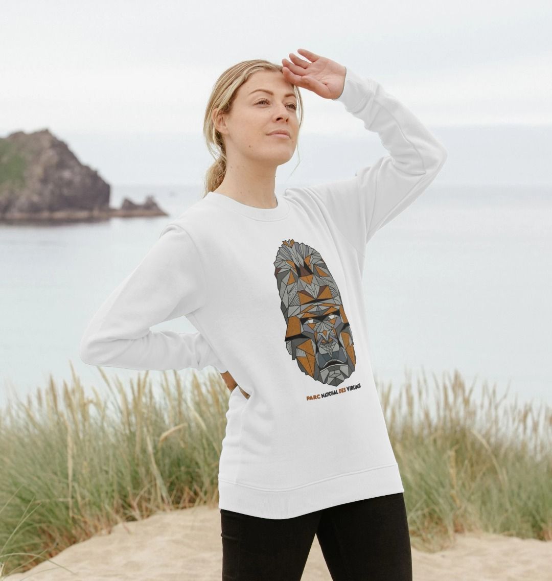 A woman wearing a white Women's Gorilla Face Sweater 