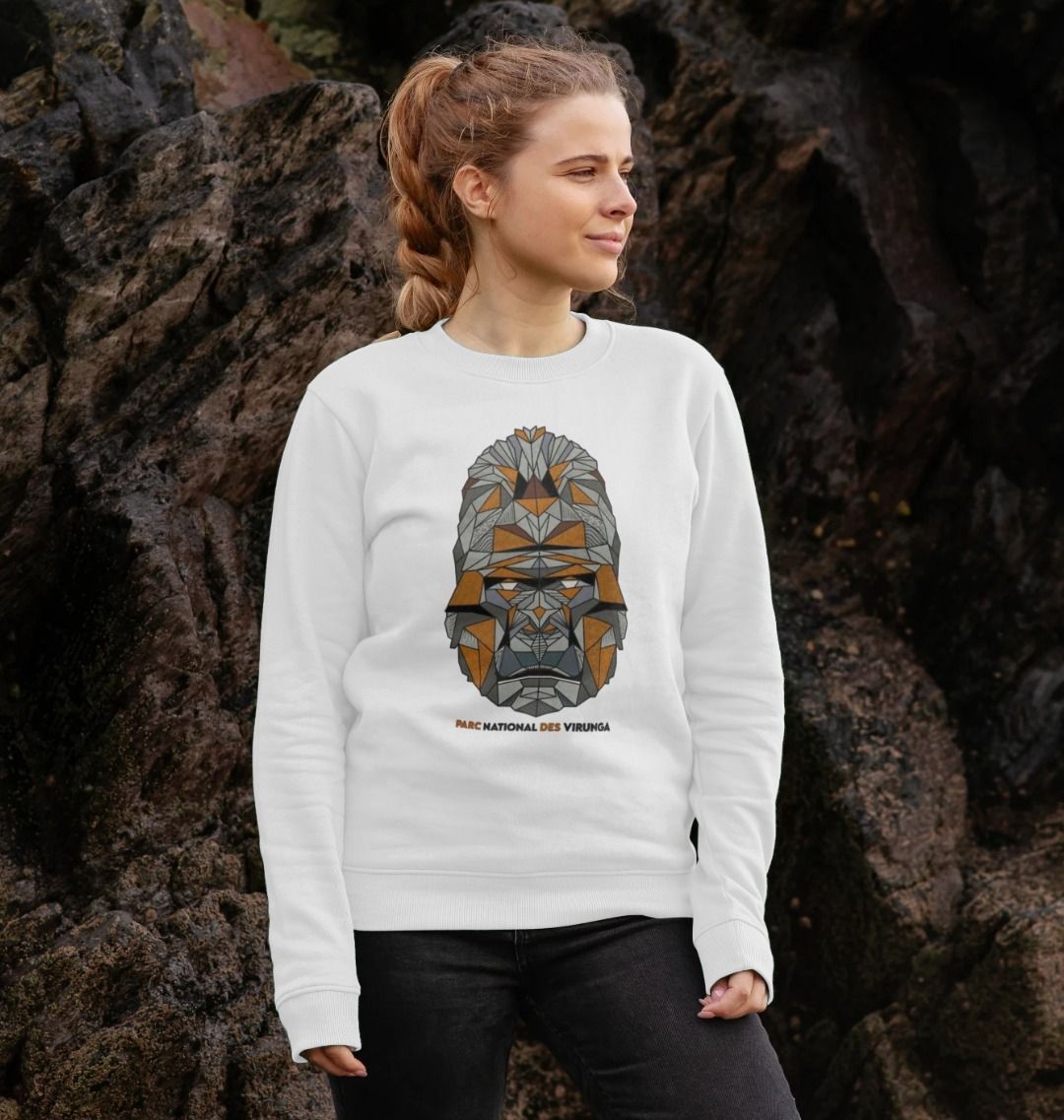 A woman wearing a white Women's Gorilla Face Sweater and a black pant