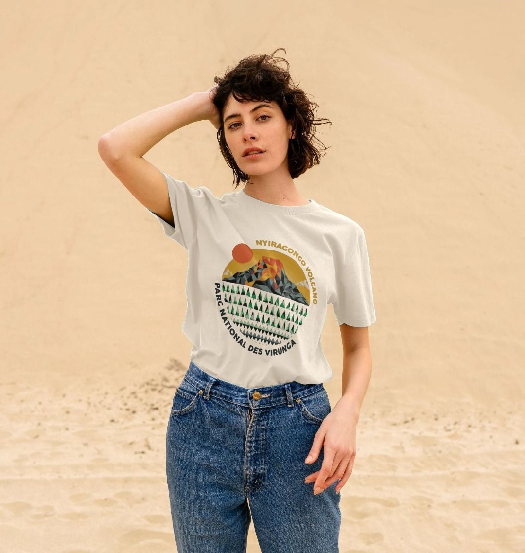 A woman wearing a white a Nyiragongo Volcano Women's T-shirt 