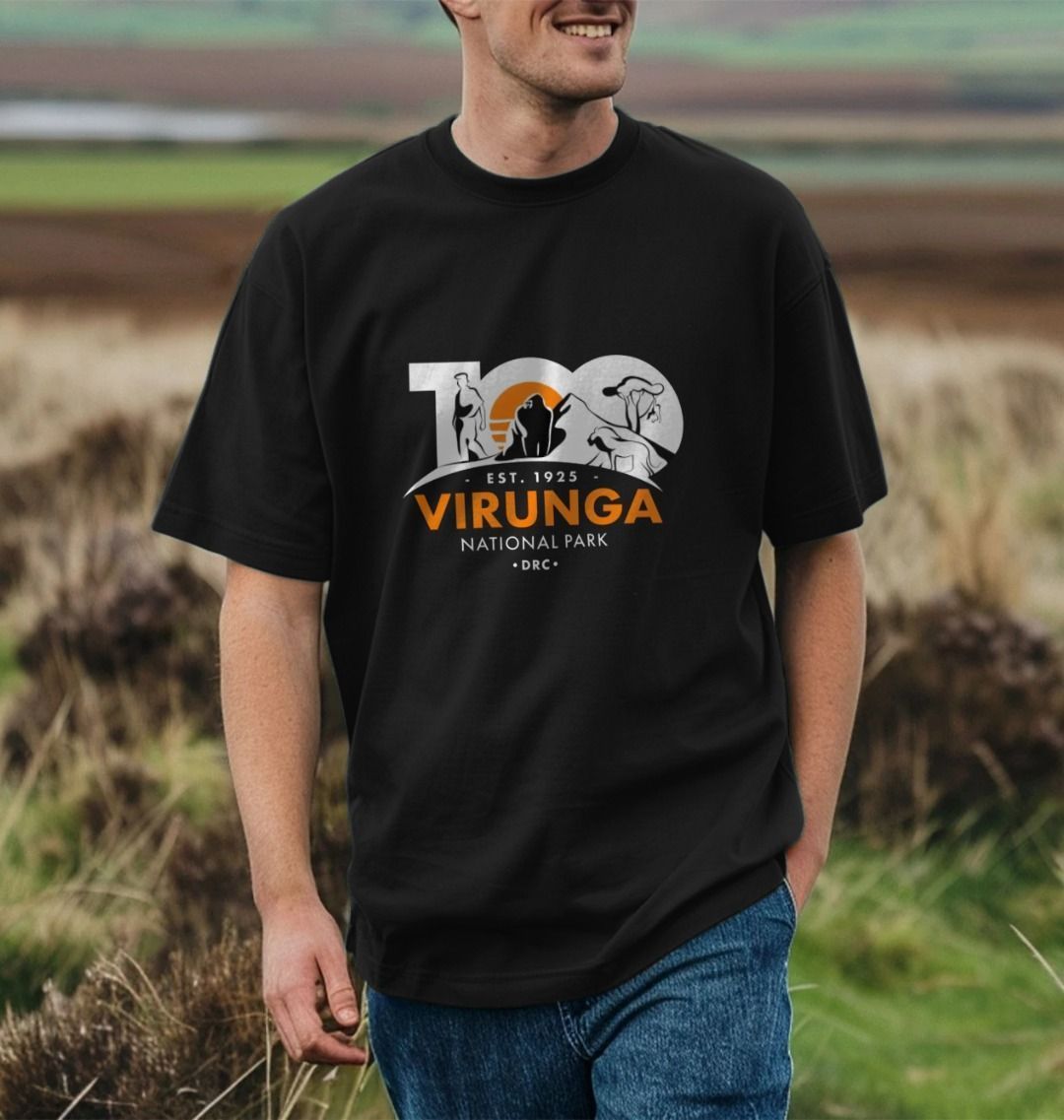 A man wearing a black Virunga 100 Men's Oversize T-shirt