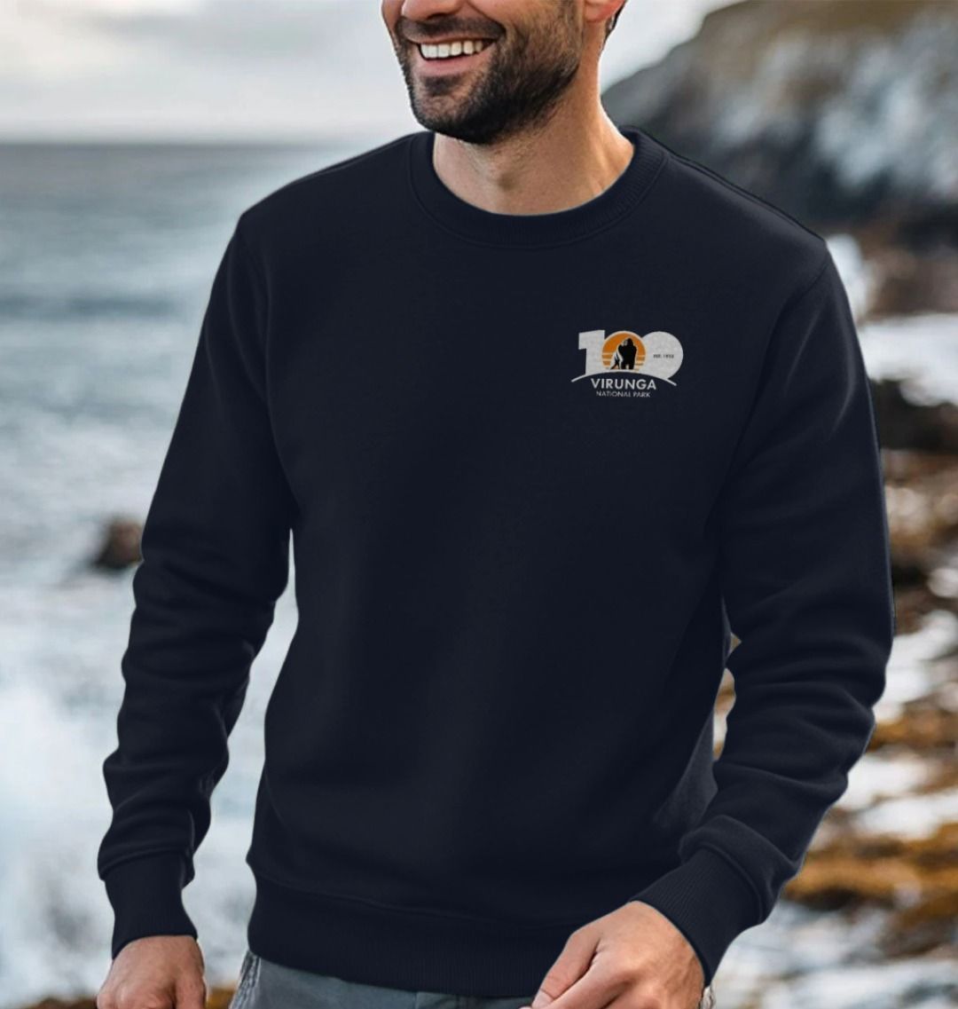 A man wearing a blue Virunga Men's Sweater