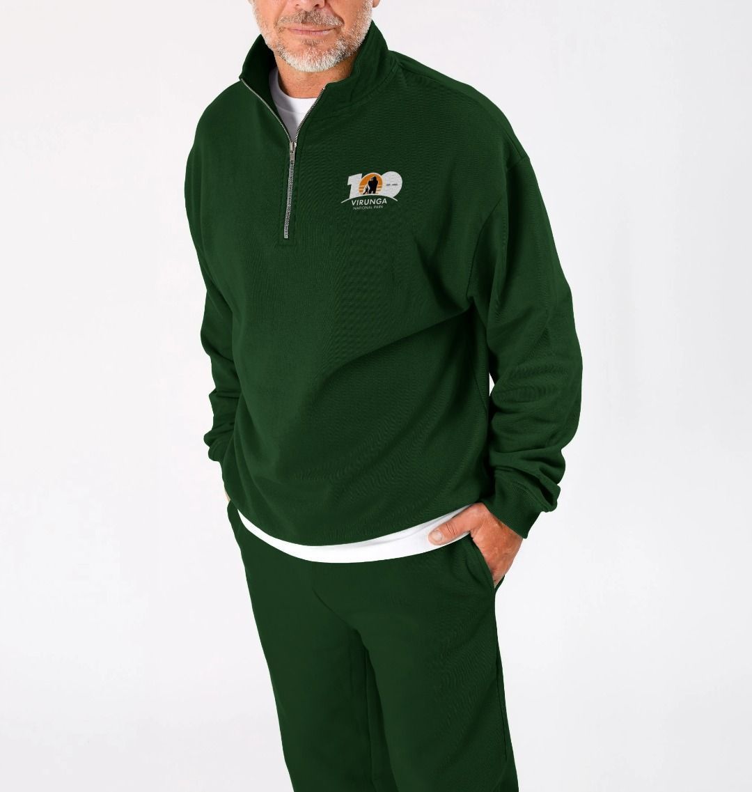 An old man wearing an Evergreen Virunga 100 Unisex Zip Pullover