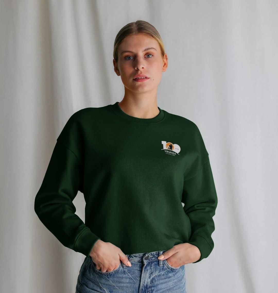 A white girl wearing an Evergreen Virunga 100 Women's Oversized Jumper 