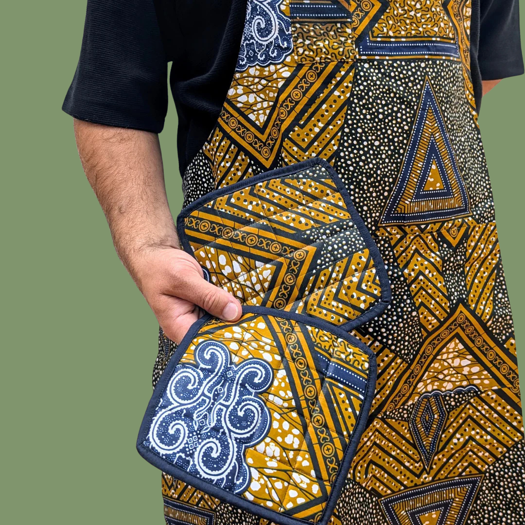Person wearing a Kitenge Apron Oven Mits Brown