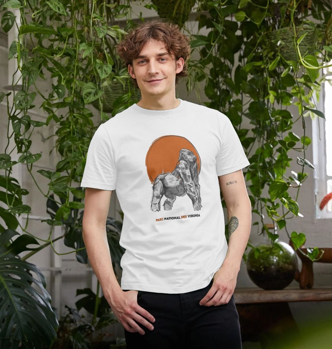 Man wearing a white Ndakasi Men's T-shirt 