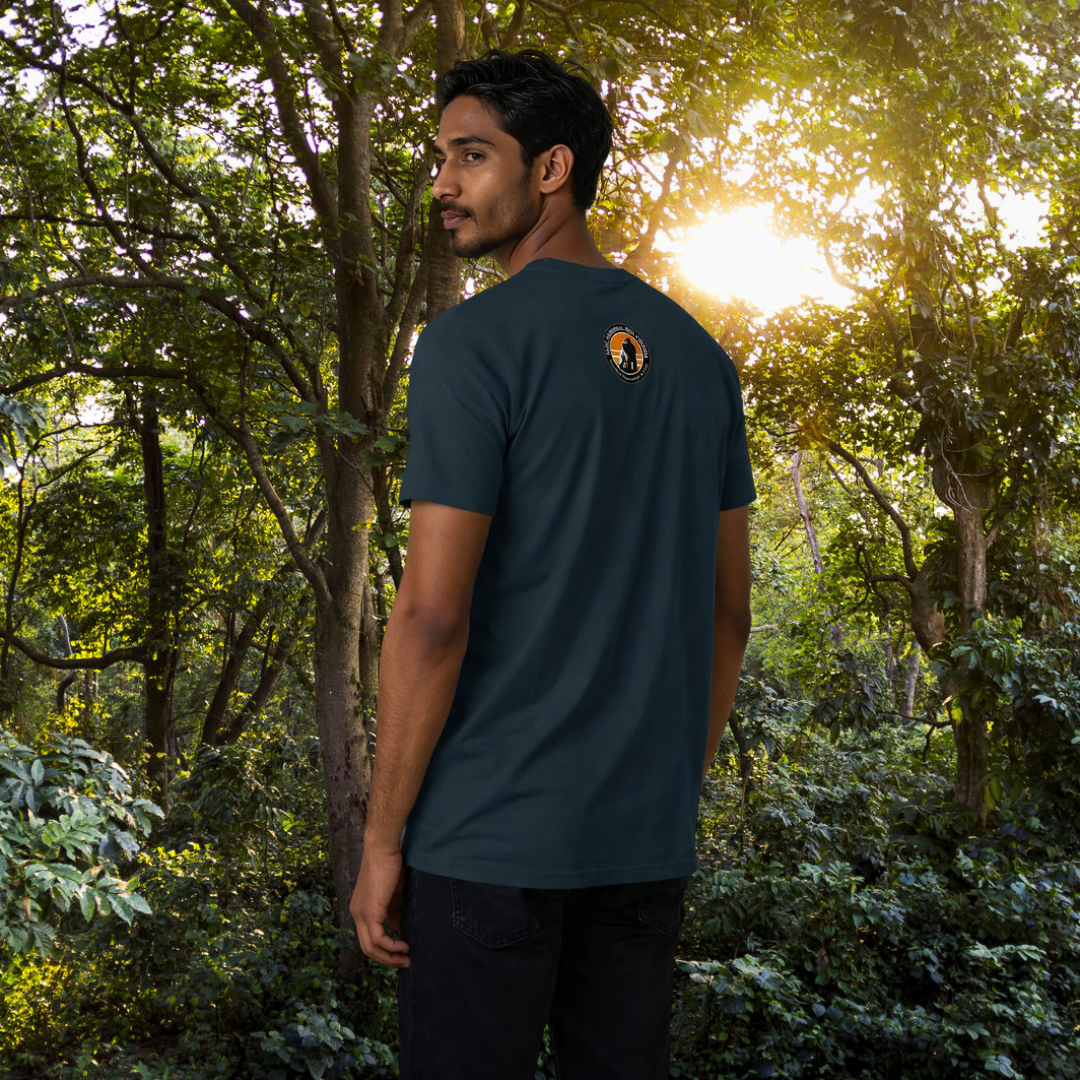 Man wearing a Demin blue Gorilla Portrait  t-shirt  in Virunga 