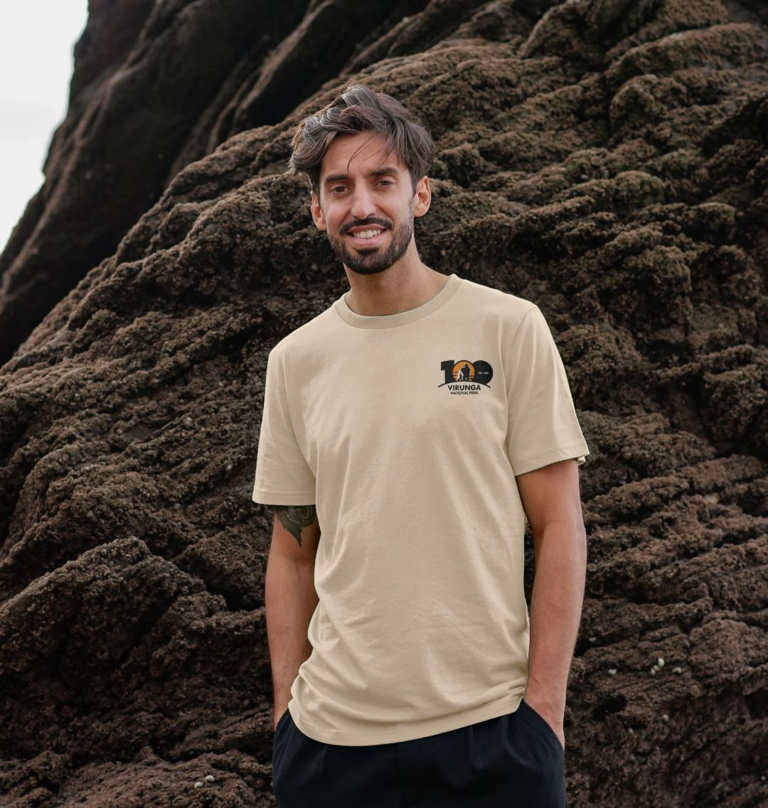 A man wearing an oat Virunga 100 Men's T-shirt