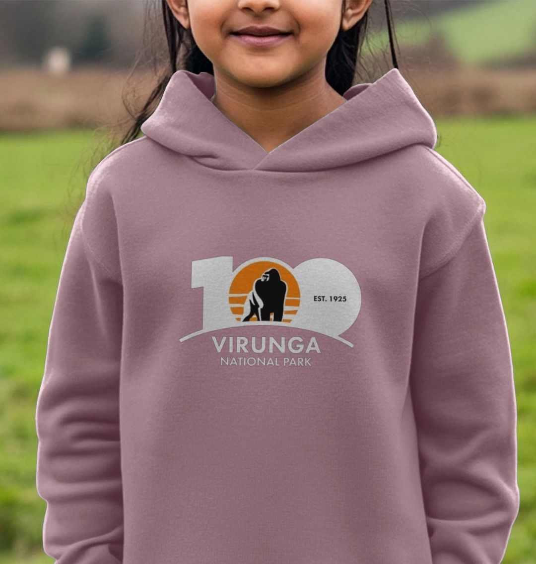 A child wearing a purple Virunga 100 Hoodie