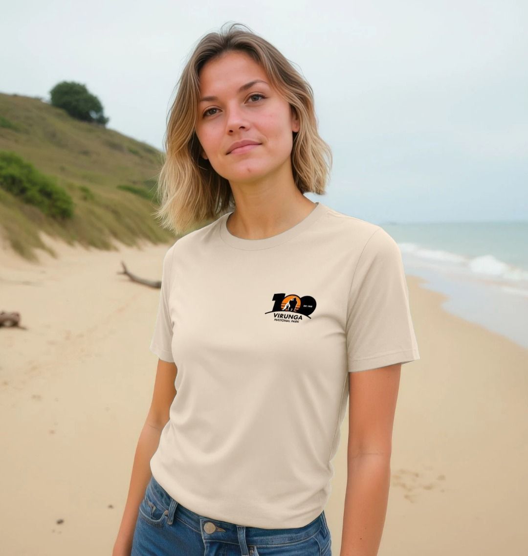 A woman wearing an oat Virunga 100 Women's T-shirt