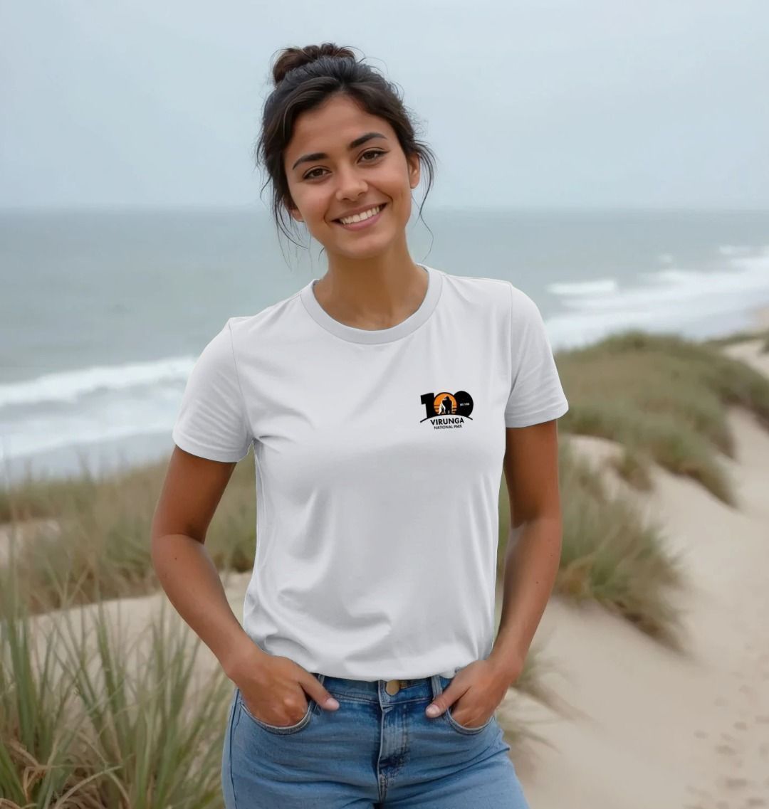 A woman wearing a white Virunga 100 Women's T-shirt